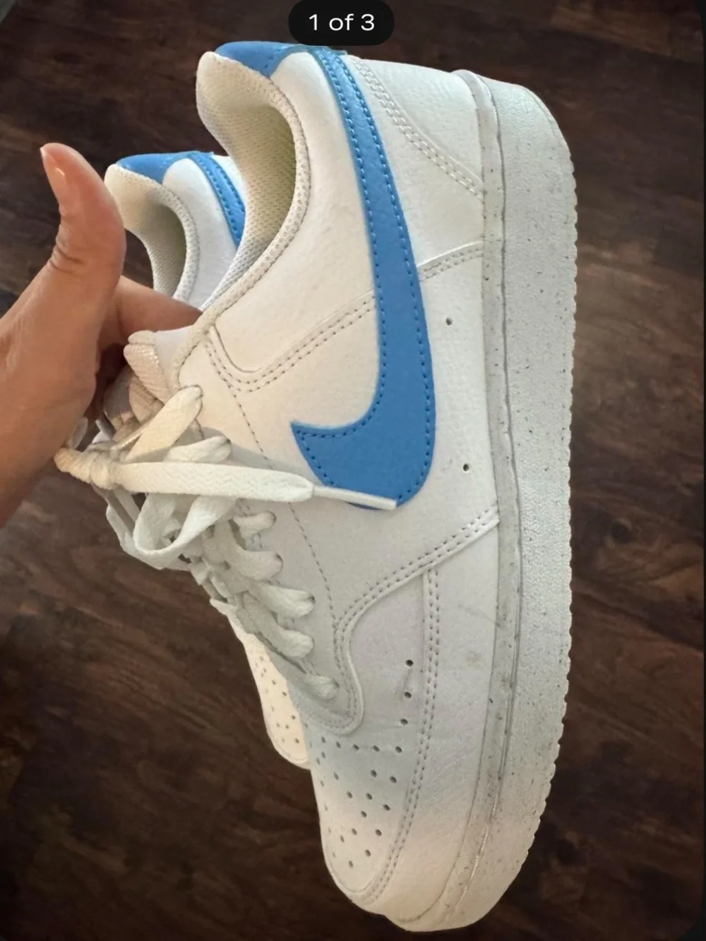 Nike White Low-Top Sneakers with Blue Swoosh